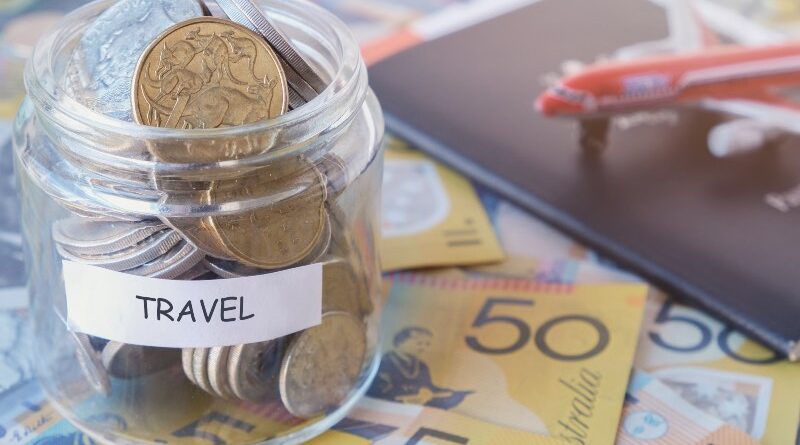 Australian money in TRAVEL jar with passport