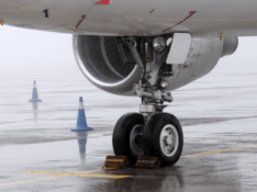 Plane grounded wheel chocks