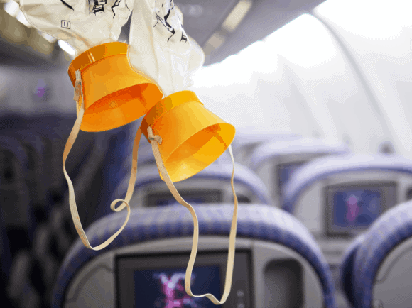 Oxygen masks fall from overhead panel in emergency