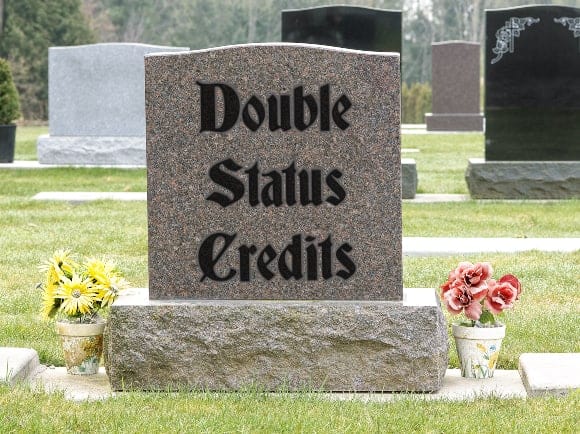 Double status credits grave