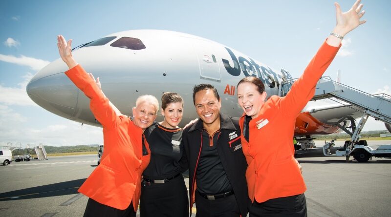 Jetstar cabin crew in front of a Dreamliner