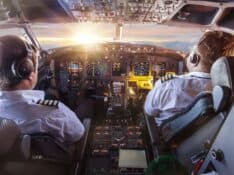 Pilots in aircraft cockpit