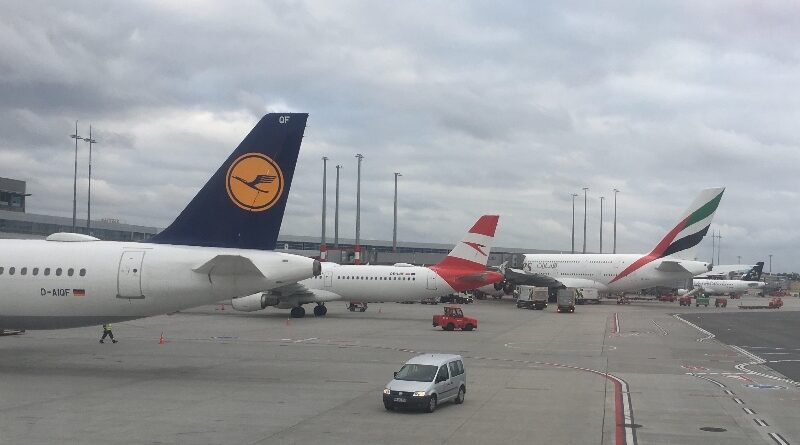 Lufthansa, Austrian and Emirates planes at Hamburg Airport.