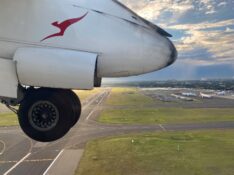 QantasLink Dash 8 takeoff from Sydney Airport