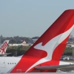 Qantas A380 in front of a Virgin Australia aircraft