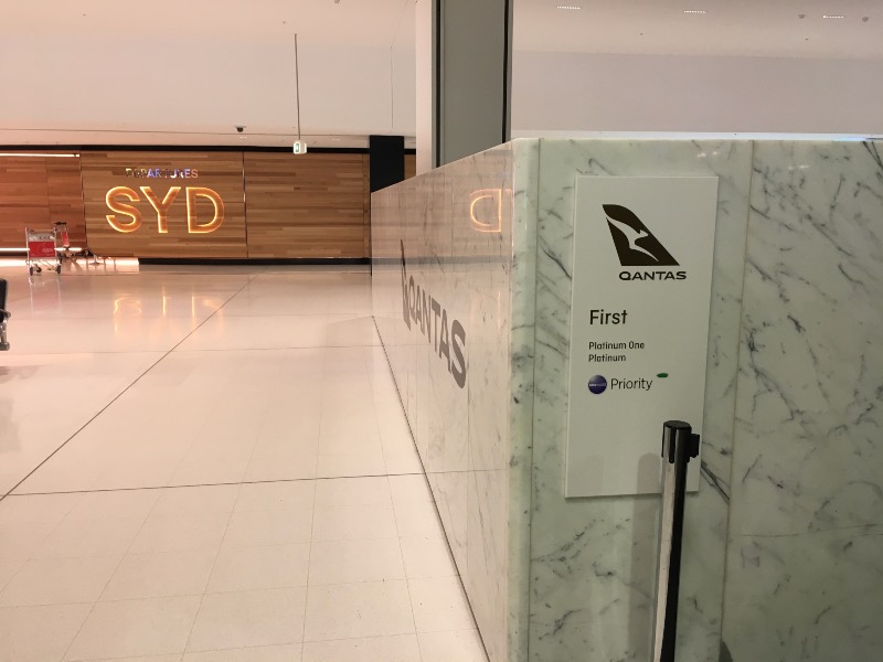 Qantas First Class check-in at Sydney Airport, accessible with Oneworld Emerald status