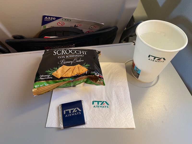 ITA Airways crackers, water and chocolate