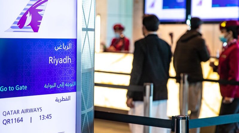 Boarding for a Qatar Airways flight from Doha to Riyadh