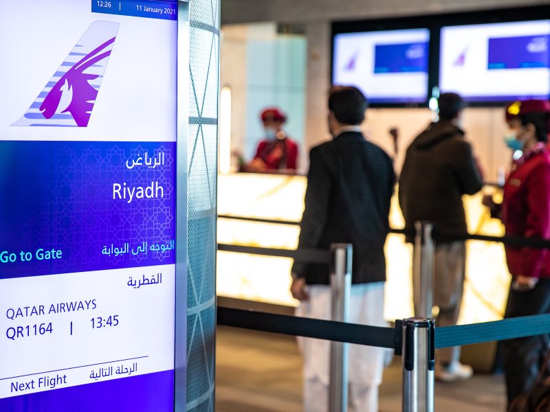 Boarding for a Qatar Airways flight from Doha to Riyadh