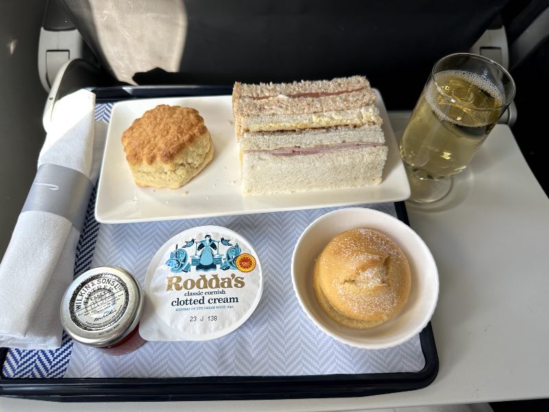 Afternoon tea including a scone with jam and cream in British Airways Club Europe short-haul business class