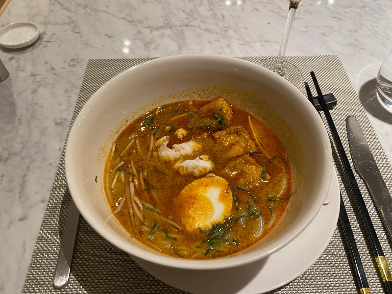 Signature laksa with crayfish, rice noodles, bean sprouts and egg