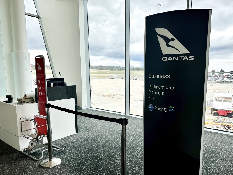 Qantas priority boarding sign at Canberra Airport