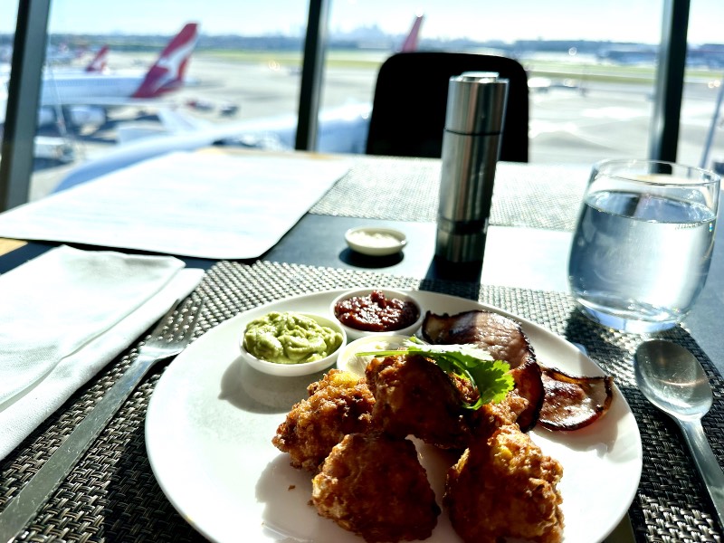 Corn fritters at the Qantas First Lounge in Sydney
