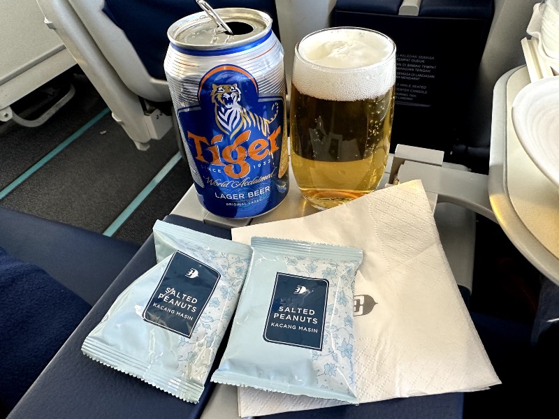 Tiger beer with salted peanuts on Malaysia Airlines