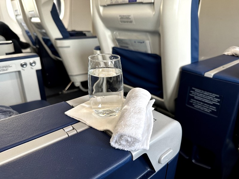 Welcome drink and refreshment towel in Malaysia Airlines Business Class