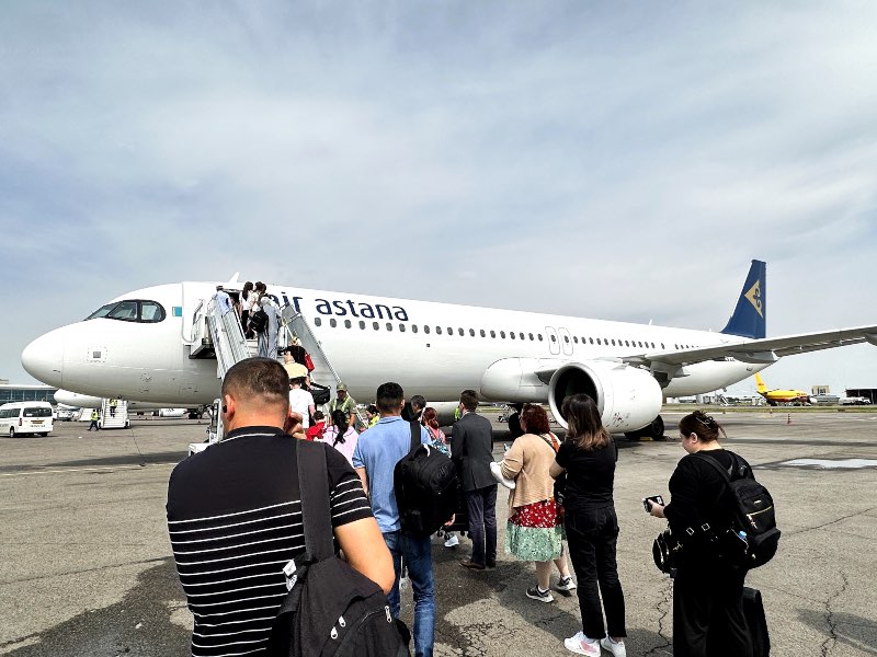 Boarding an Air Astana flight at Almaty Airport