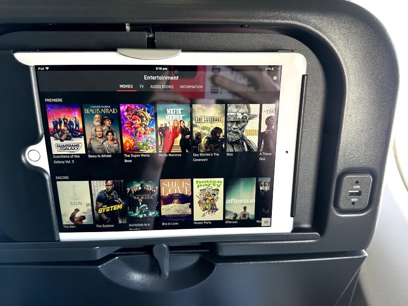 iPad connected to Q-Streaming in Qantas economy class IFE