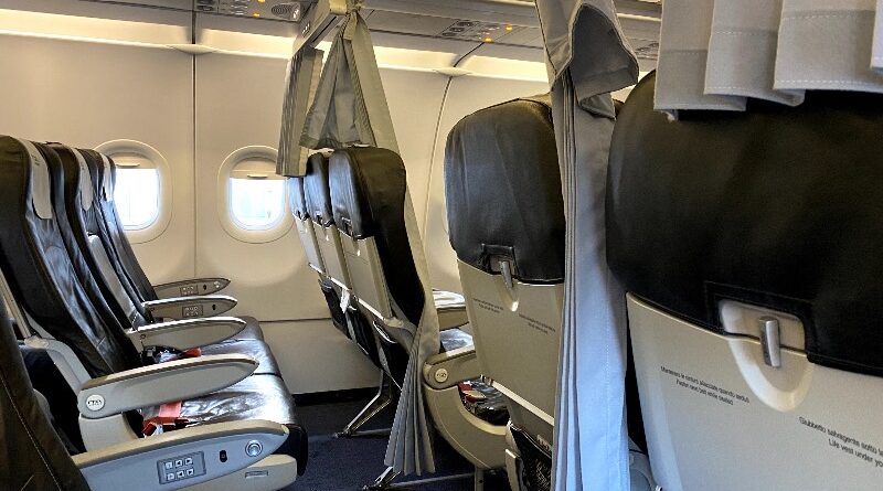 The curtain dividing Economy and Business Class on a short-haul ITA Airways flight