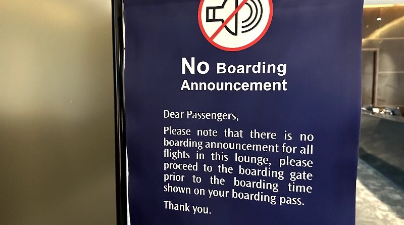 No boarding announcements sign in a silent airport lounge