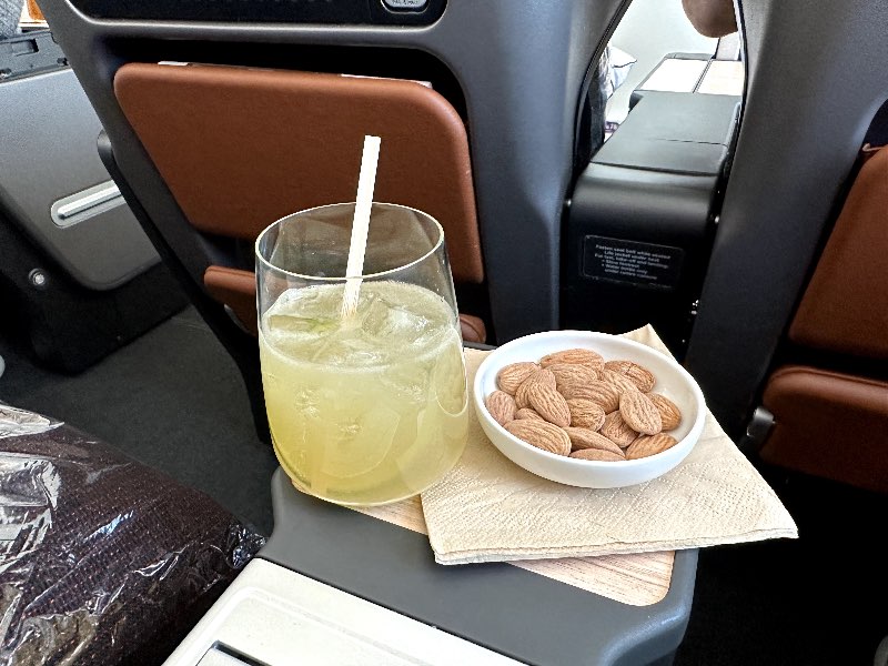 A Margarita with smoked almonds in Qantas Premium Economy