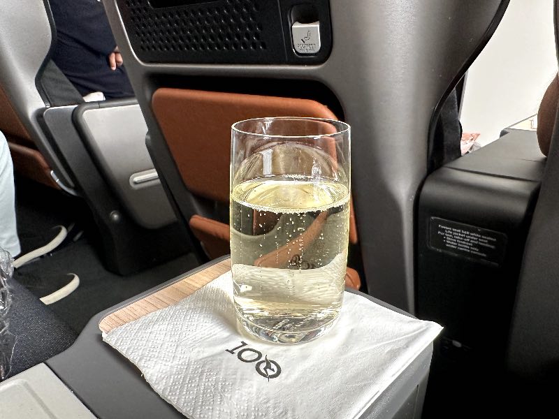 Pre-departure sparkling wine in Qantas Premium Economy