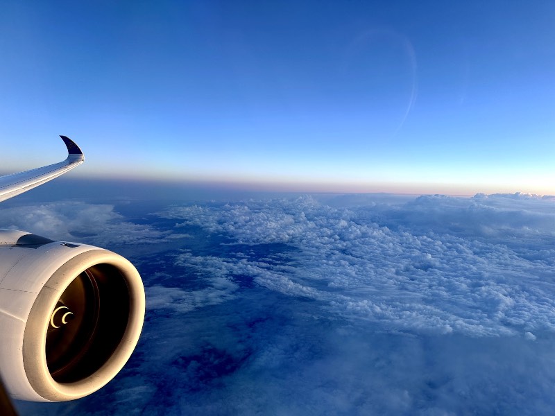 View of the sunrise on a Thai Airways A350