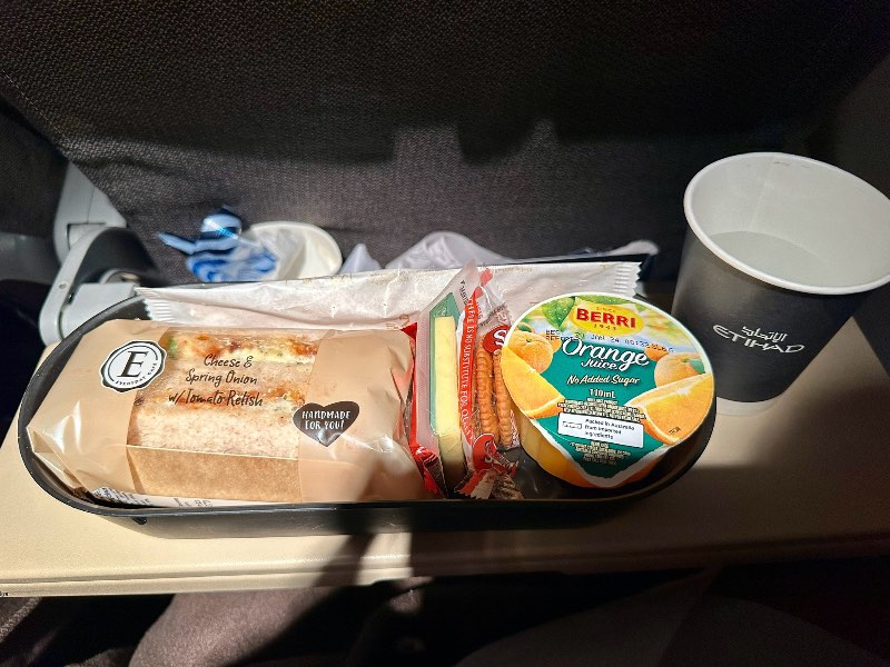 Cheese & spring onion sandwich with cheese & crackers as a mid-flight snack on EY451 in economy