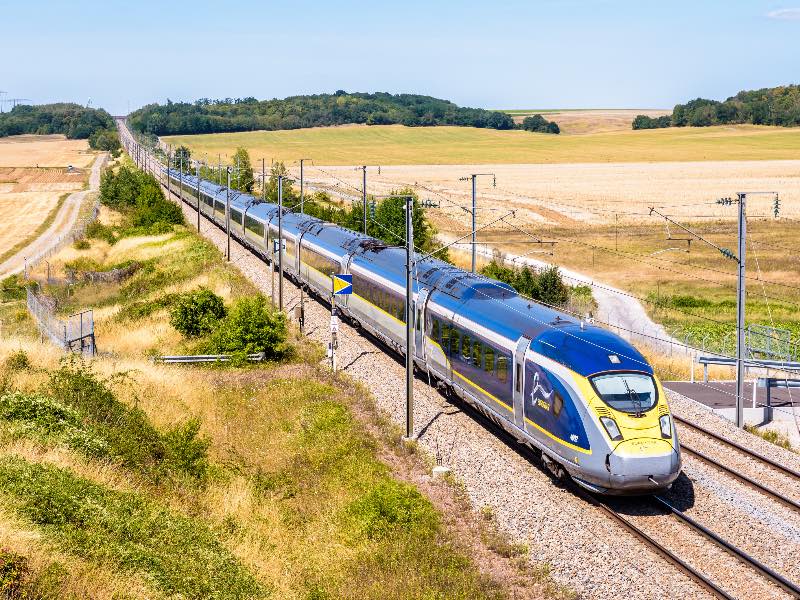 Baron, France - July 29, 2020: A Eurostar e320 high speed train is driving from Paris to London on the LGV Nord, the North European high speed railway line, in the french countryside.