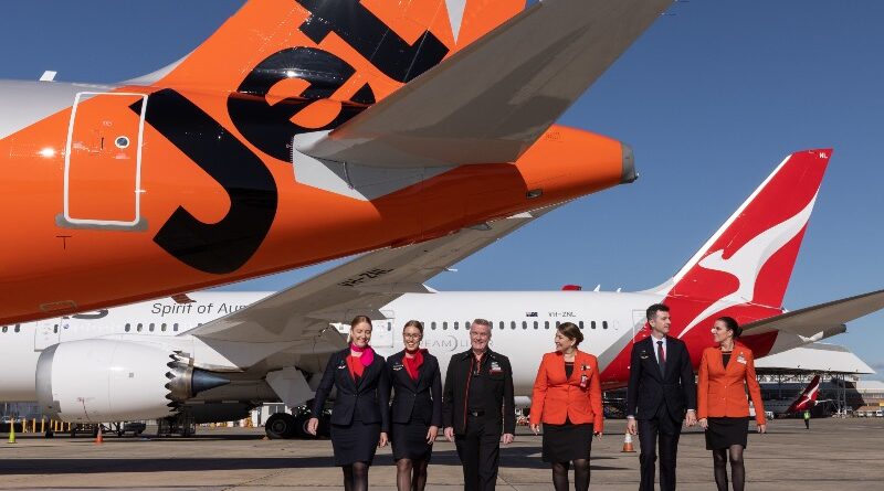Jetstar A321neo and Qantas 787 aircraft tails with Qantas and Jetstar cabin crew