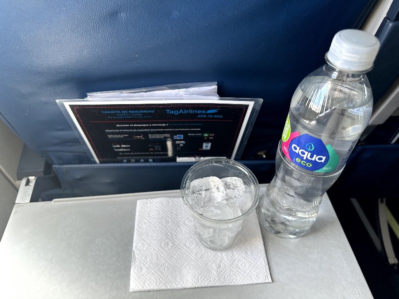 Bottled water with ice on board Tag Airlines