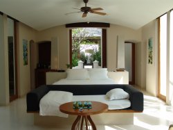 Deluxe Beach Villa - Bedroom icluding king + day bed.JPG