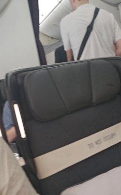 Empty blocked premium economy seat (22J) on QF3 SYD-AKL 