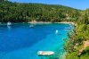many-different-islands-in-one-fishing-boats-on-turquoise-sea-in-bay-near-fiskardo-village-kefalo.jpg