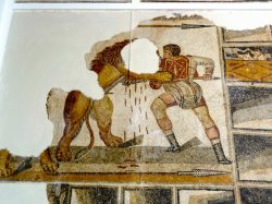Tunis Bardo mosaic lion attacking man.jpg