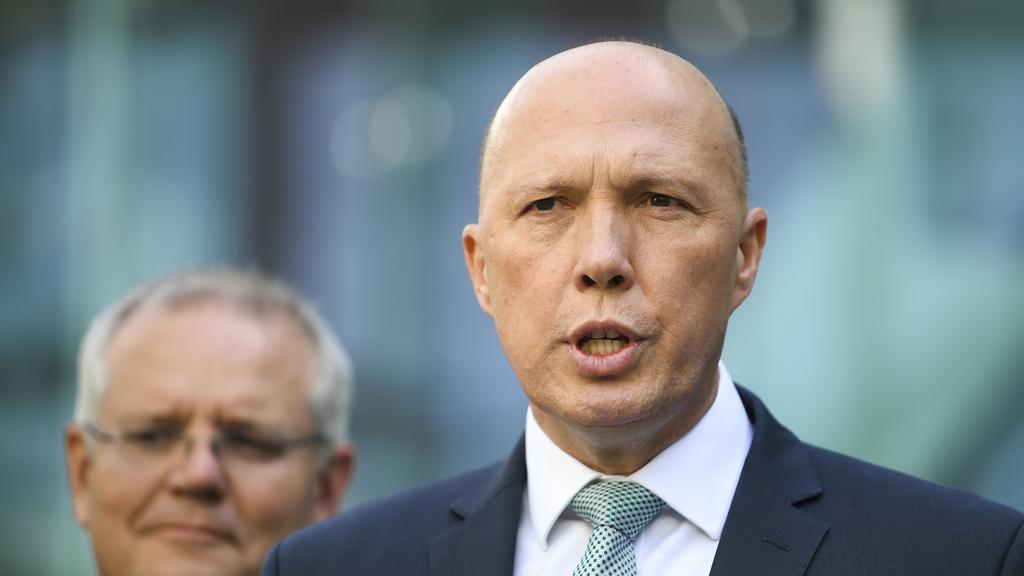Home Affairs Minister Peter Dutton says Australians should reconsider their need to travel overseas at the moment. Picture: AAP Image/Lukas Coch