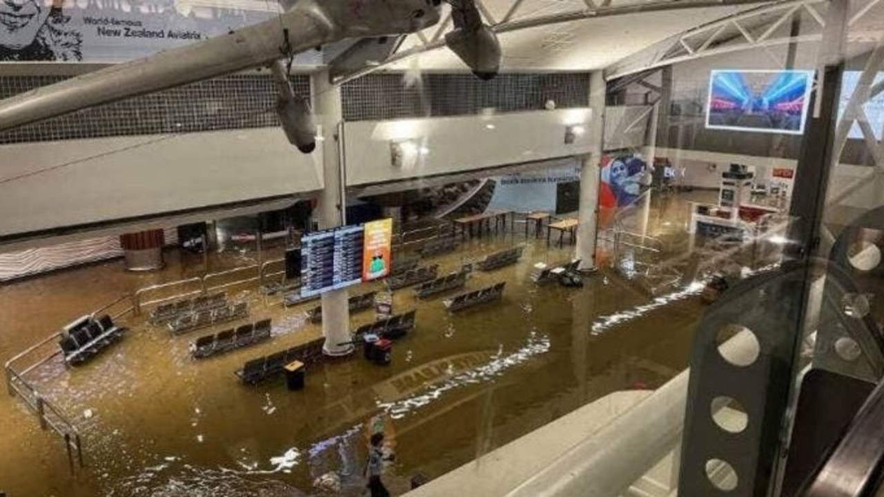 An airport terminal inundated with floodwater in Auckland.