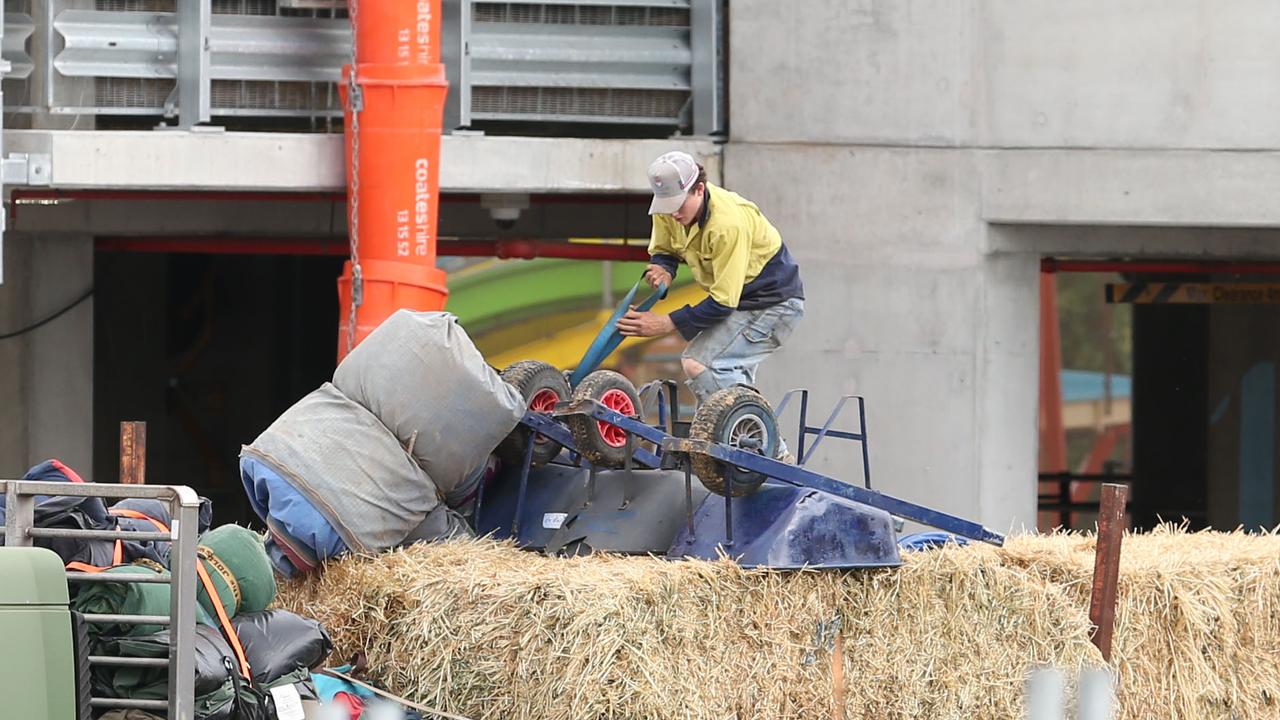 Farmers, families and producers pack up after the Ekka was cancelled. Picture: Zak Simmonds