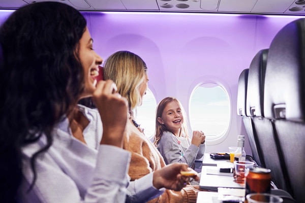 familly with Kid enjoying a Virgin Australia flight