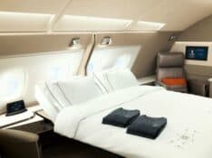 By paying tax by credit card, cove has been able to travel the world in the luxury of Singapore Airlines Suites