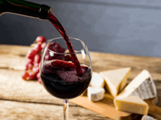 Red wine with cheese grapes