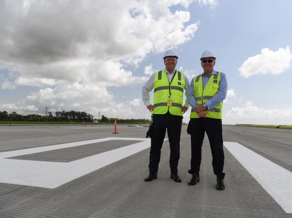 Gert-Jan de Graaff and Paul Coughlan from Brisbane Airport Corporation on the new runway