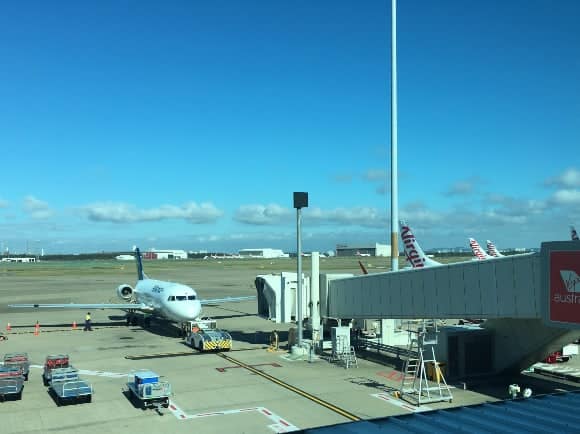 Alliance Airlines Fokker 70 at the gate in Brisbane