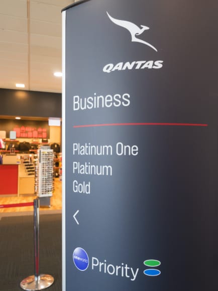 Qantas Priority Boarding sign
