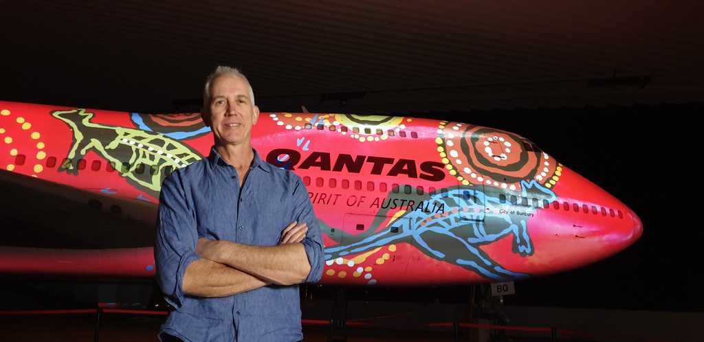 See the 747 lit up in Wunala Dreaming colours during the Luminescent Longreach experience