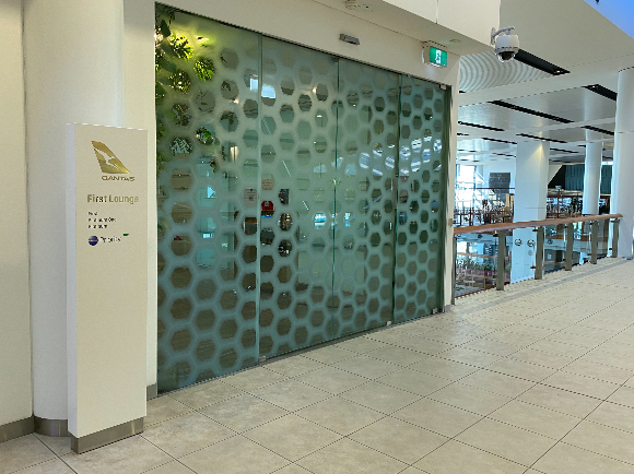 Qantas First Lounge entrance, closed door