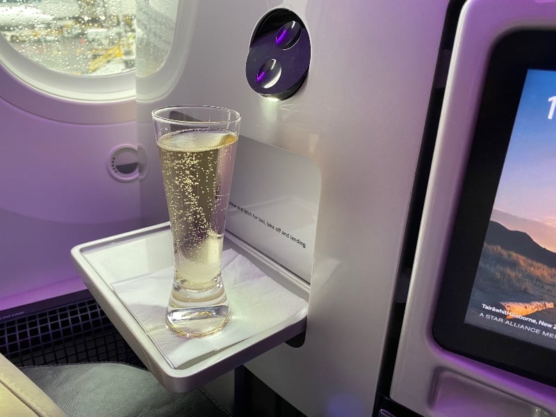 Pre-departure champagne in Air New Zealand Business Class