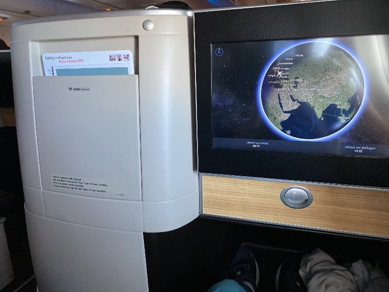 In-flight entertainment screen and footwell in SWISS A340 Business Class