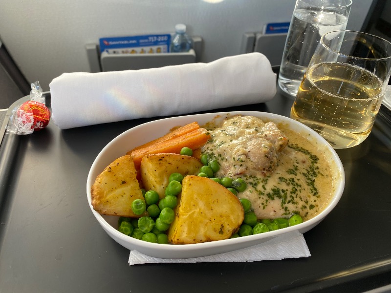 Chicken with vegetables in a mushroom sauce served on a Qantas flight from Canberra to Sydney
