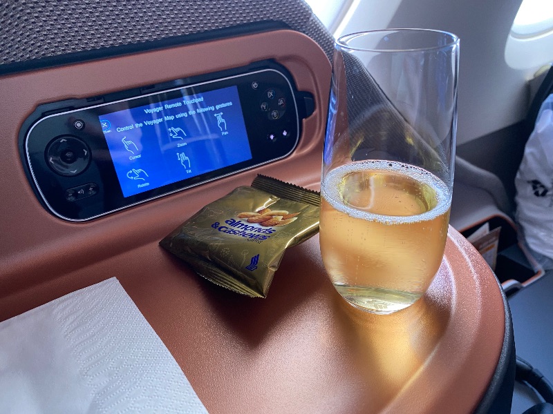 Champagne and nuts were served after takeoff