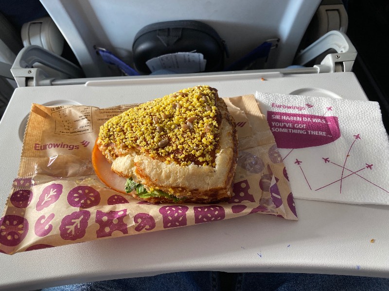 Cornbread roll with chicken breast and cranberries on Eurowings